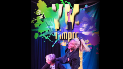 Happy woman raises her arm and puts her leg on the shoulder of the woman who is squatting.